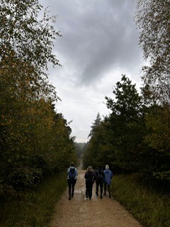 Bourne Woods - Another group of people on a muddy path.